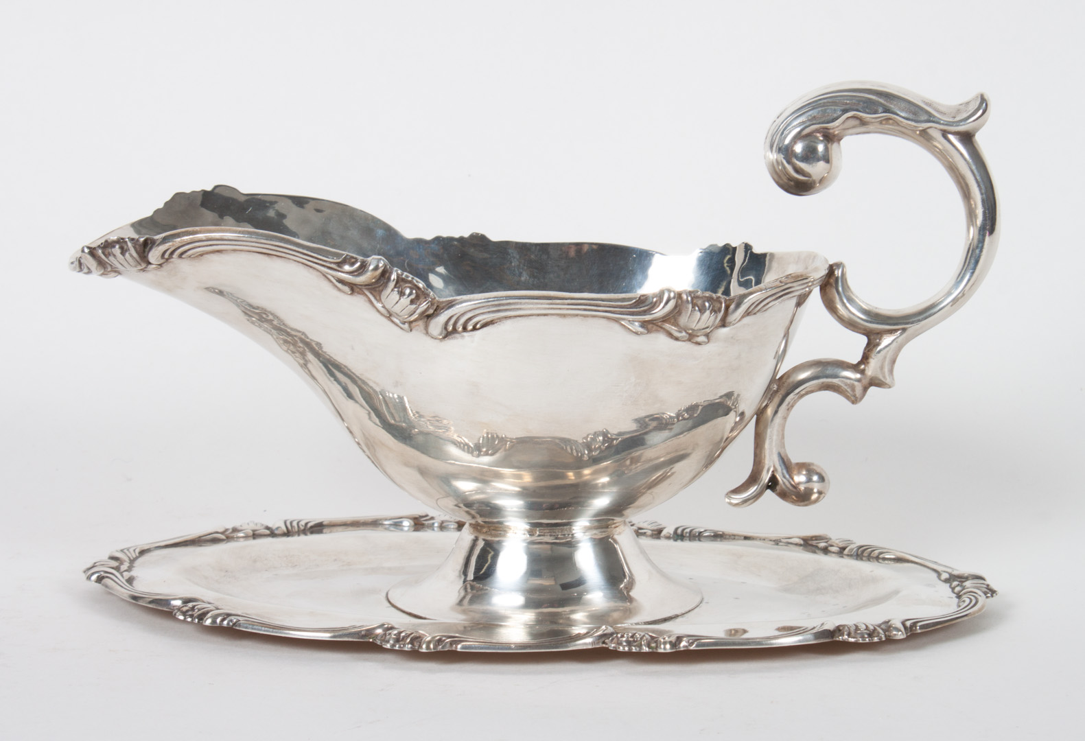 Appraisal: Sterling silver gravy boat under tray ozt