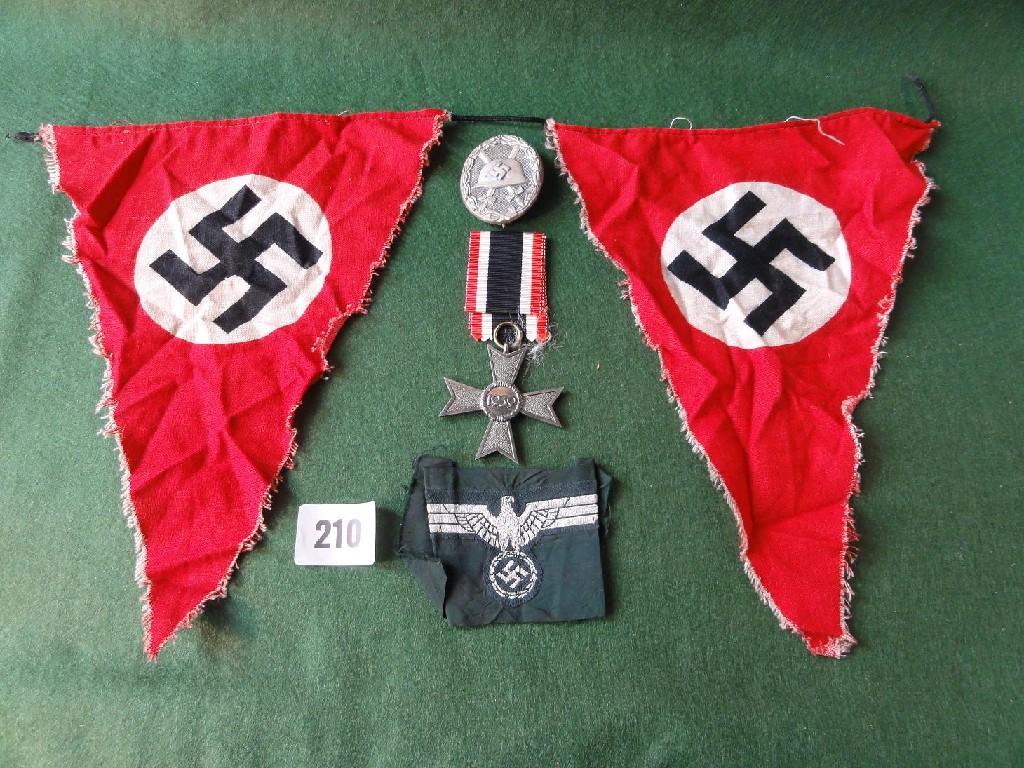 Appraisal: A small collection of various Nazi memorabilia including bunting medal