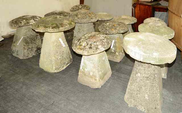 Appraisal: A PAIR OF LARGE COTSWOLD LIMESTONE STADDLE STONES the circular