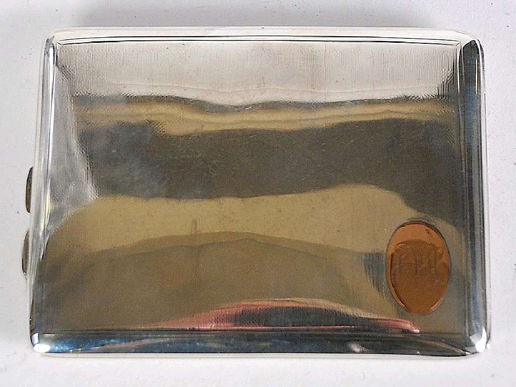 Appraisal: SILVER POCKET CIGARETTE CASE oblong cushion shaped and engine turned