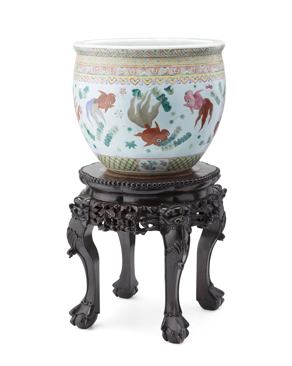 Appraisal: FAMILLE ROSE FISH BOWL AND MARBLE TOP STAND QING DYNASTY