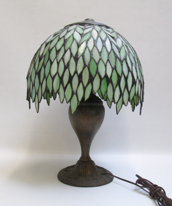 Appraisal: STAINED AND LEADED GLASS TABLE LAMP the leaded glass dome