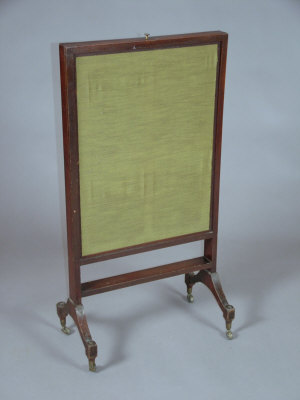 Appraisal: A mahogany fire screen th century with three green velvet