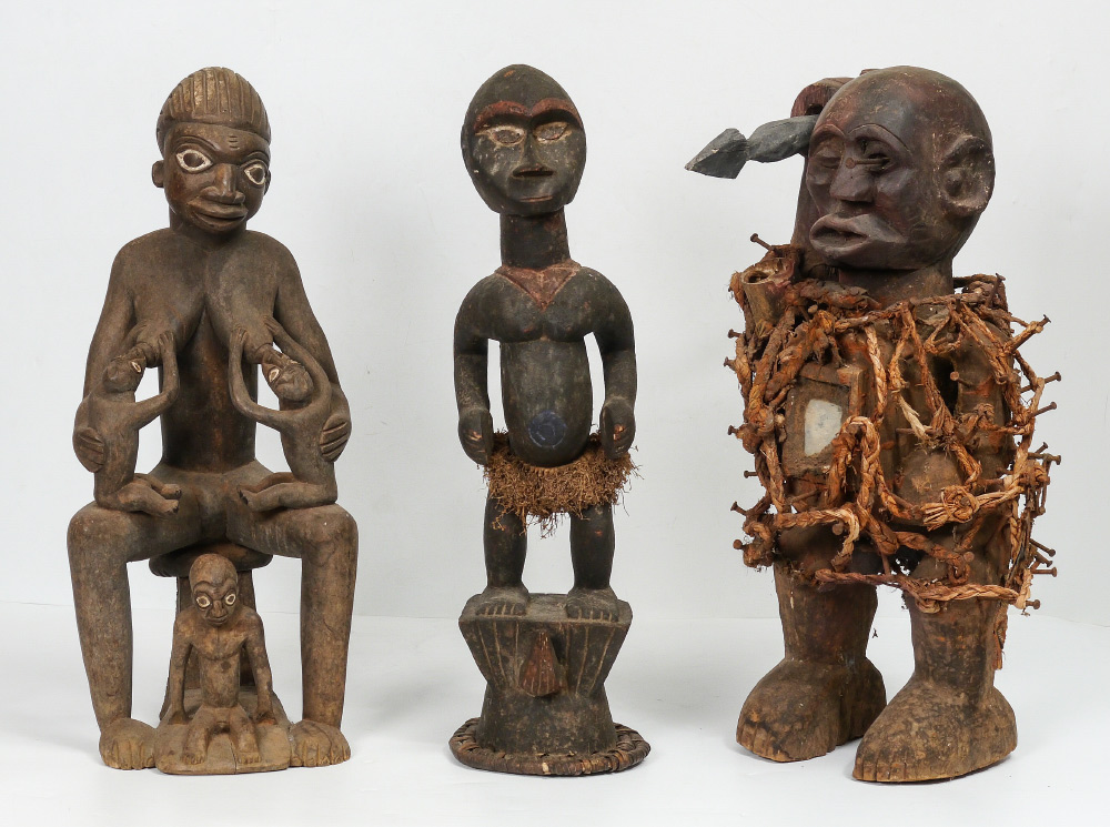 Appraisal: AFRICAN CARVED FIGURES AND FETISH pieces total to include Nail