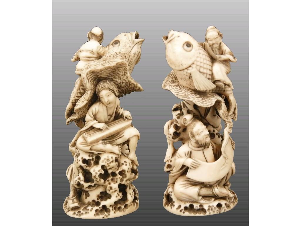 Appraisal: Japanese ivory okimono carved with a group of three figures