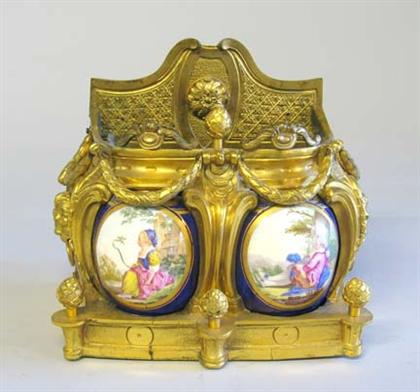 Appraisal: Louis XV style gilt bronze and porcelain jardiniereThe bomb sides