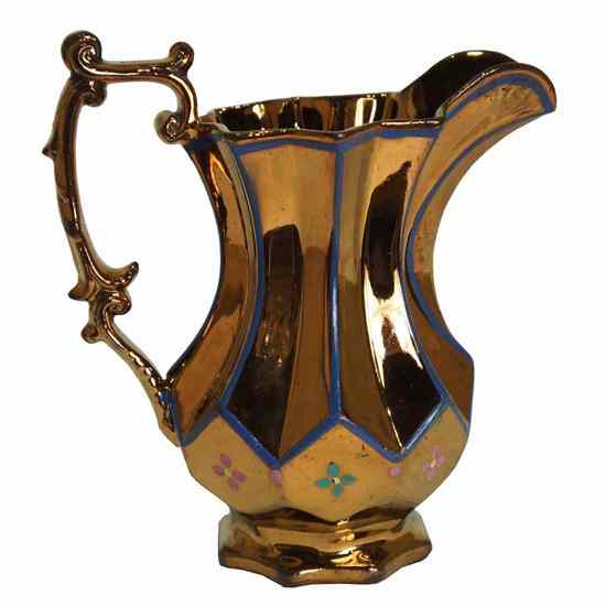 Appraisal: An English Victorian Copper Lustre Pitcher circa having a sparrow's