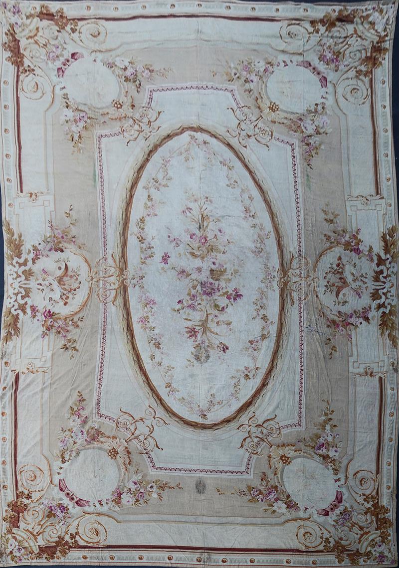 Appraisal: FRENCH AUBUSSON CARPET With a central floral oval medallion with