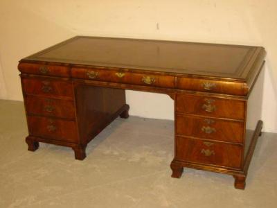 Appraisal: A WALNUT PEDESTAL DESK of Georgian design early th century