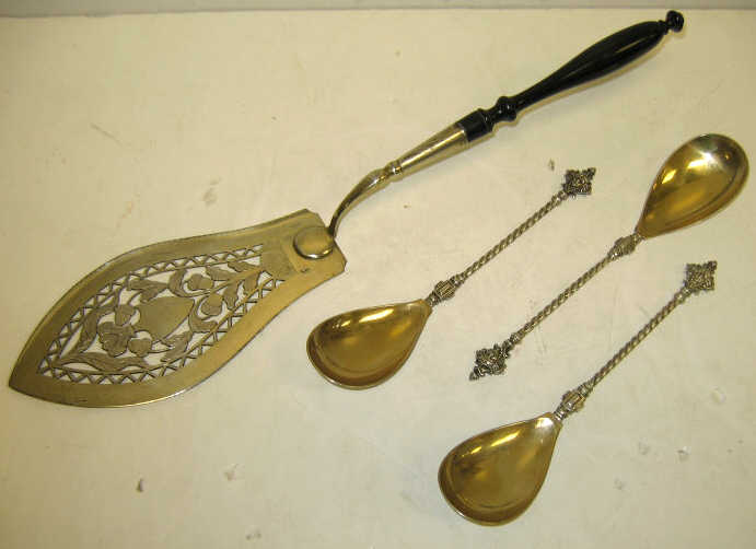 Appraisal: FOUR GERMAN SILVER FLATWARE PIECES Three silver spoons with gold