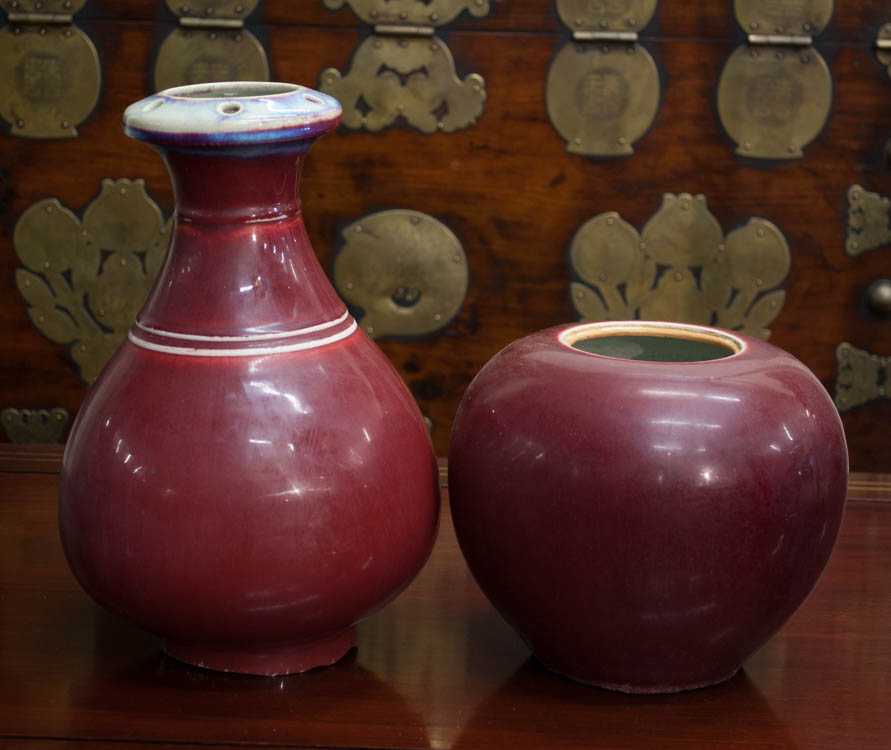 Appraisal: TWO CHINESE FLAMBE VASES the Yuhuchun vase with a pierced