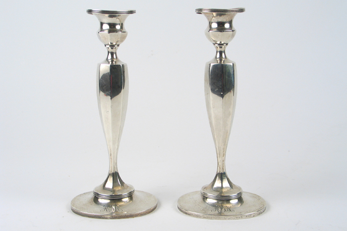 Appraisal: A PAIR OF TIFFANY STERLING SILVER CANDLESTICKS the plain oval