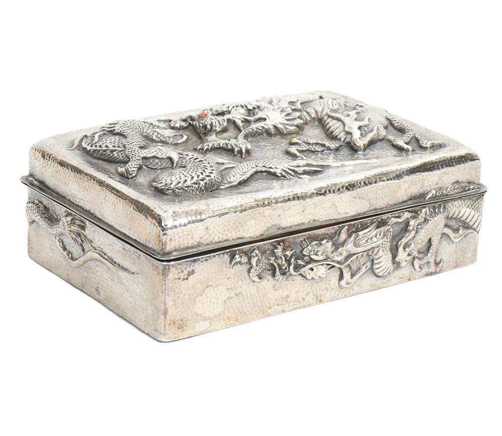 Appraisal: JAPANESE SILVER LIDDED 'DRAGON' BOXRectangular Japanese hammered silver 'Dragon' box