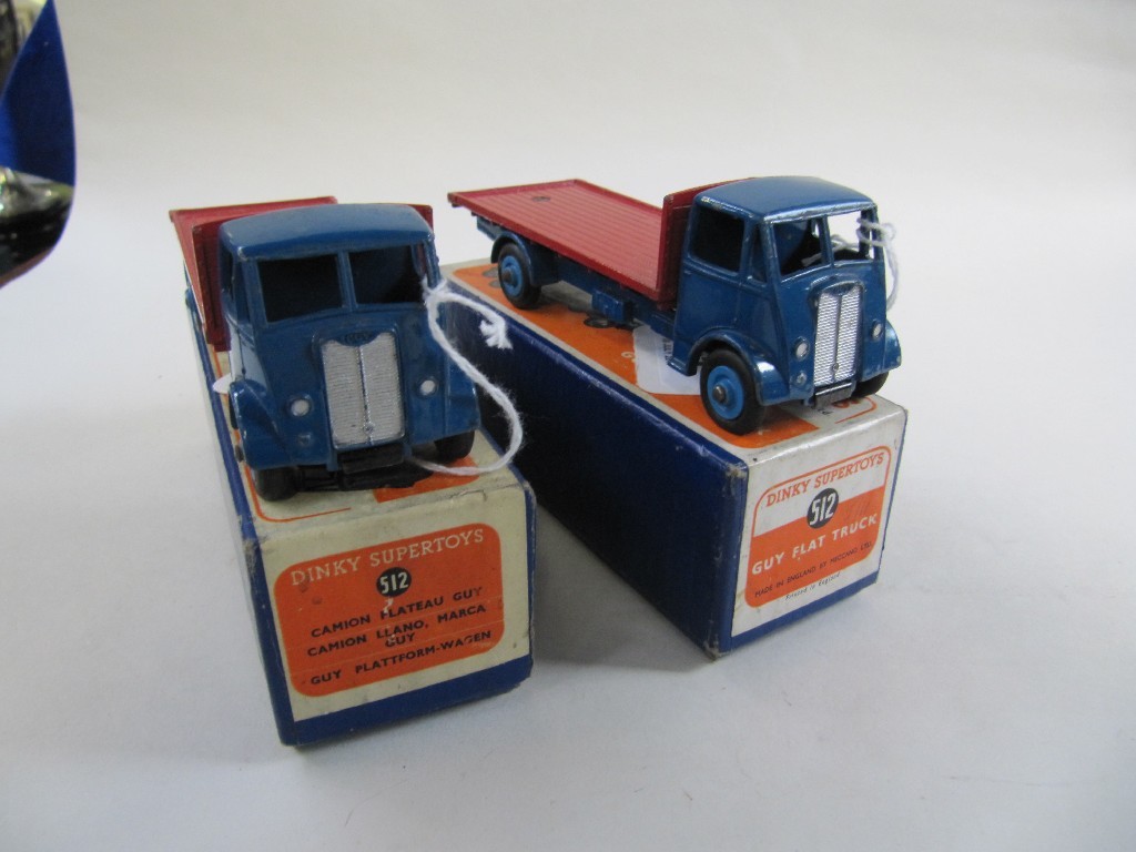 Appraisal: Lot comprising two Dinky Guy Flat Trucks No with their