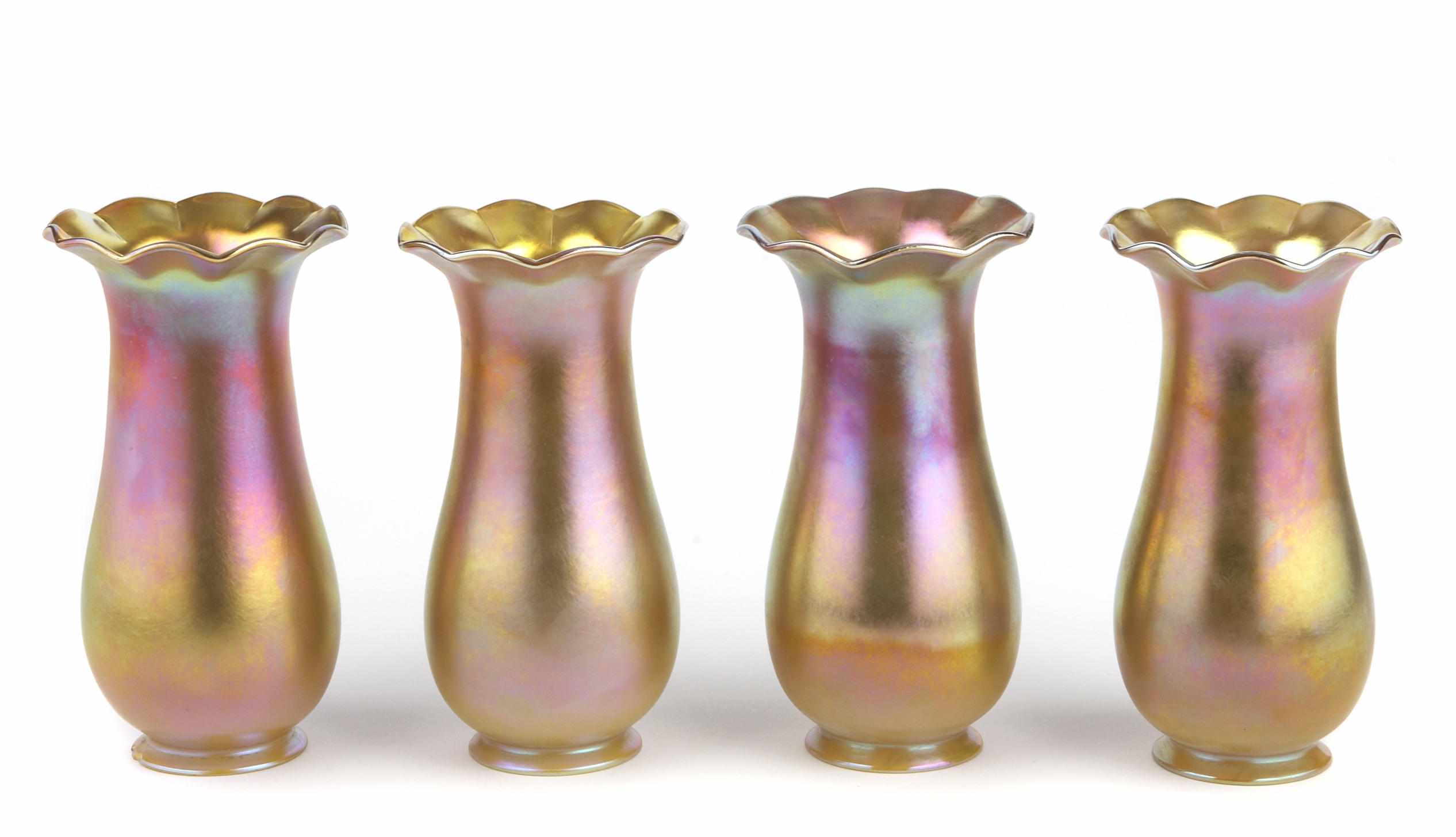 Appraisal: A set of nine Quezal iridescent glass tall shades with