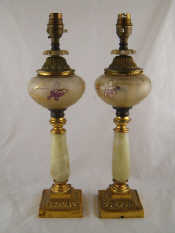 Appraisal: A pair of electric brass and onyx table lamps c