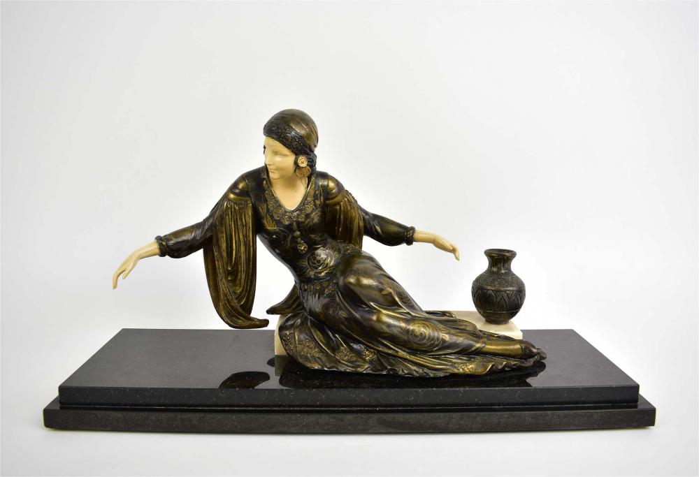 Appraisal: FRENCH ART DECO PATINATED BRONZE MARBLE LADYCirca The well-dressed lady