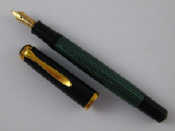 Appraisal: A Pelikan fountain pen with a carat gold nib