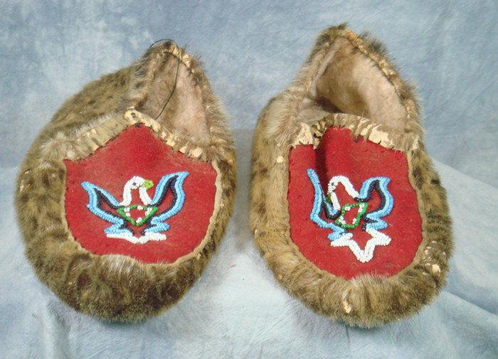 Appraisal: Pr beaded seal skin felt Northwest Native American moccasins blue