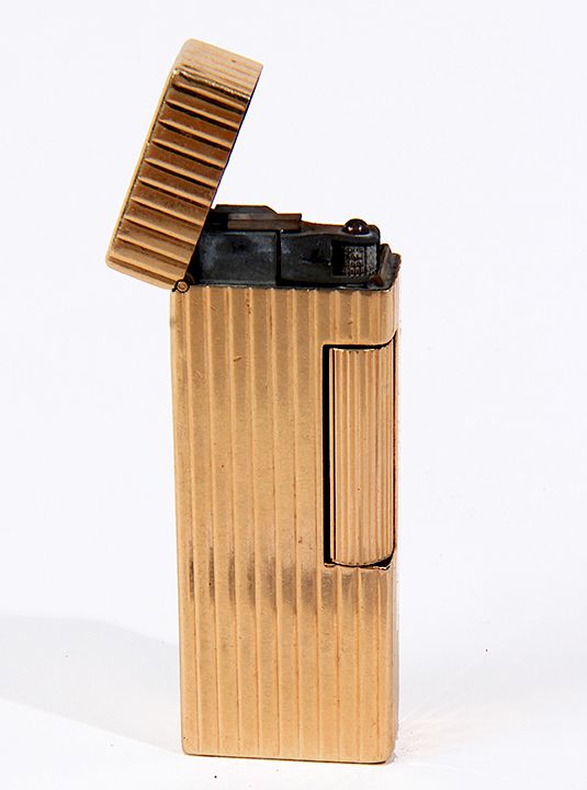 Appraisal: DUNHILL GOLD CIGARETTE LIGHTER A NICE EXAMPLE OF THIS K