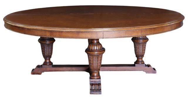 Appraisal: Monumental circular oak dining table th c having matched veneer