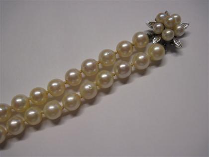 Appraisal: Double strand graduated cultured pearl necklaceOf classic form mm cultured