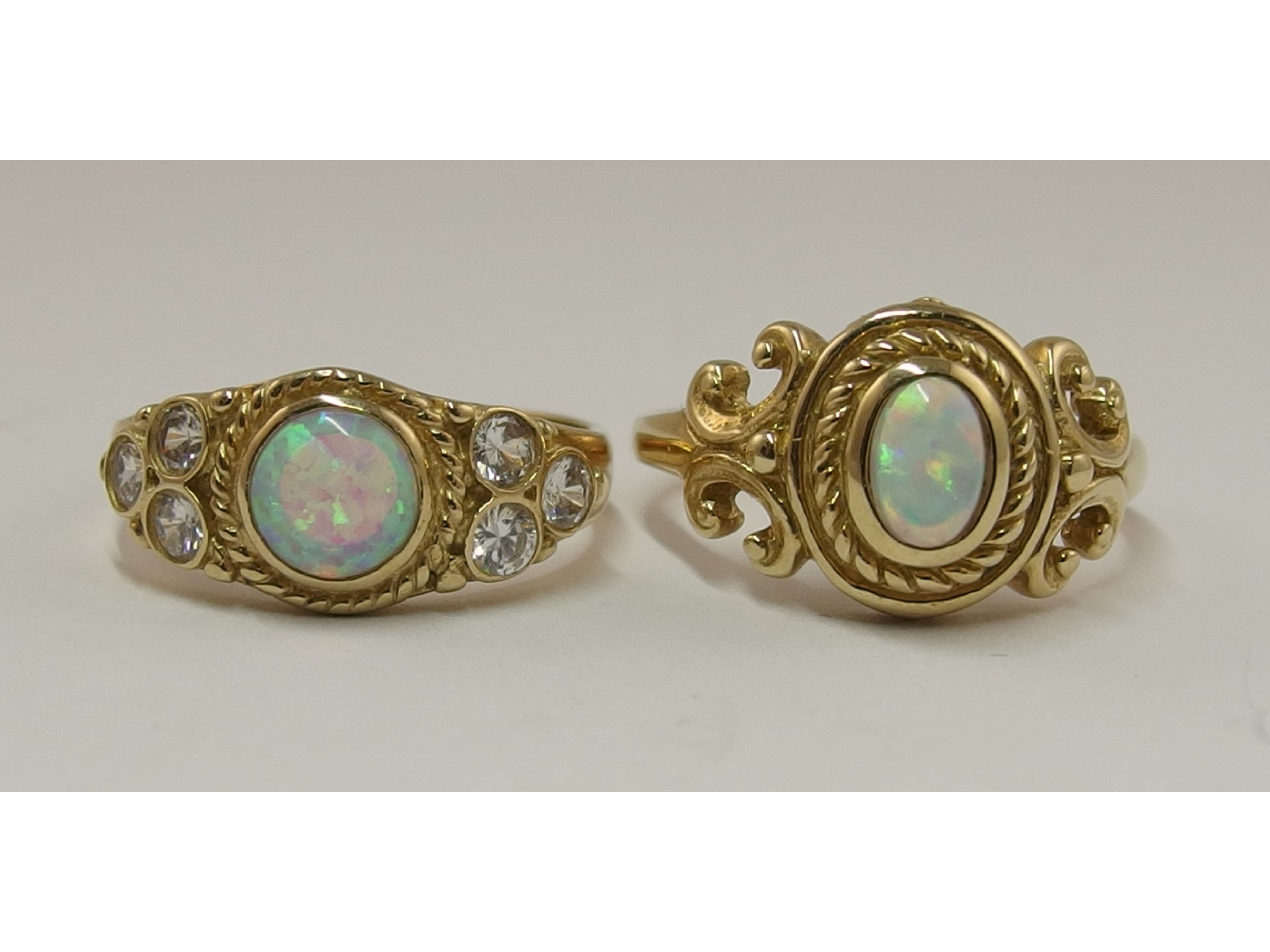 Appraisal: Two ct opalite and clear gem stone dress rings