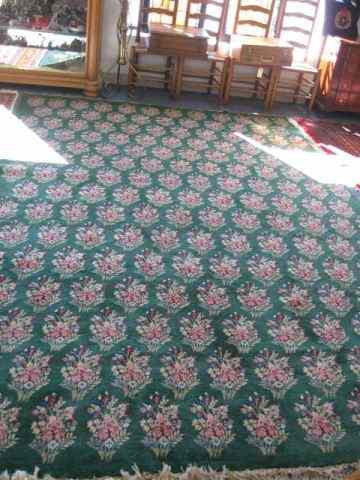 Appraisal: Chinese Handmade Room Size Rug elegant floral bouquets on green