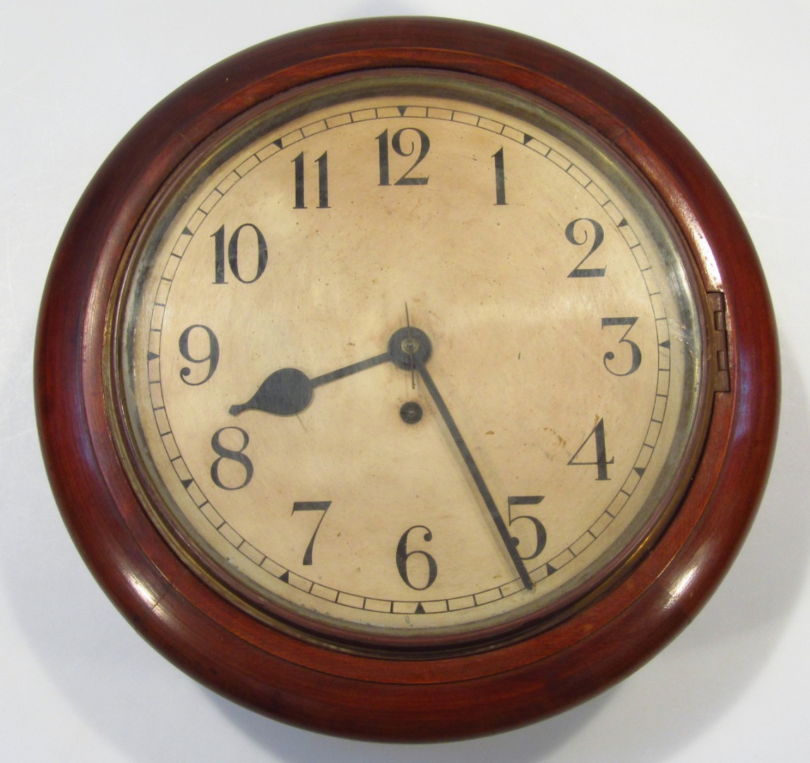 Appraisal: An early thC mahogany cased wall clock the cm dia