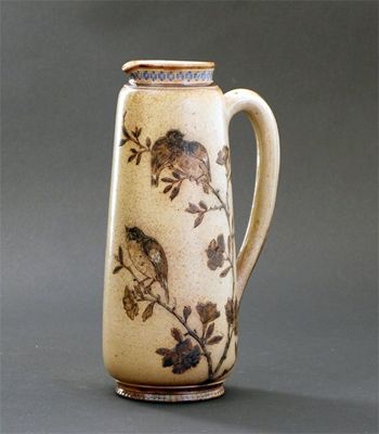 Appraisal: A Martin Brothers stoneware jug incised with finches flying and