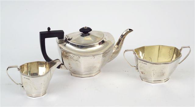 Appraisal: GEORGE V SILVER THREE PIECE TEA SERVICE SHEFFIELD comprising teapot