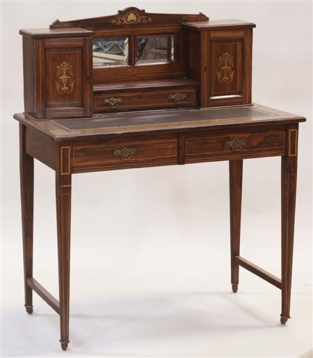 Appraisal: A late Victorian rosewood inlaid lady's desk the mirrored back