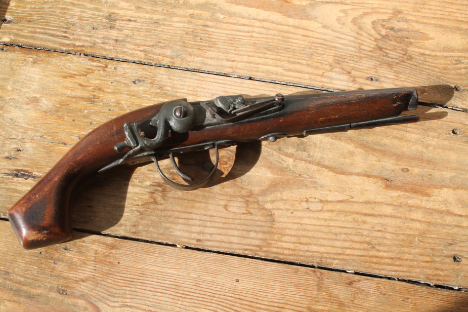 Appraisal: A replica Flintlock pistol