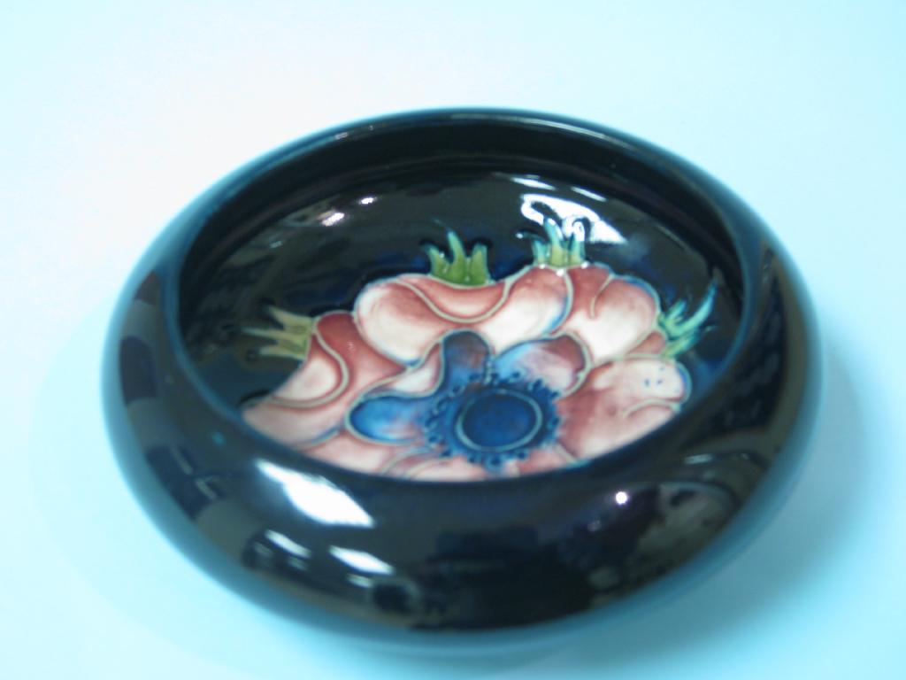 Appraisal: A small Moorcroft Bowl floral on a blue ground