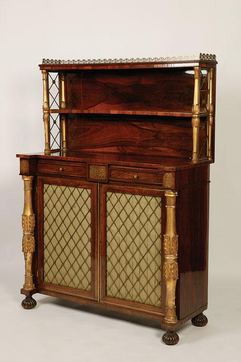 Appraisal: A REGENCY ROSEWOOD AND PARCEL-GILT CHIFFONIER the raised back with