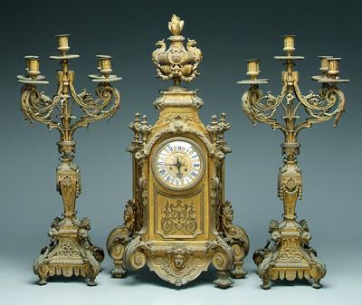 Appraisal: French gilt bronze clock garniture clock with flaming urn with