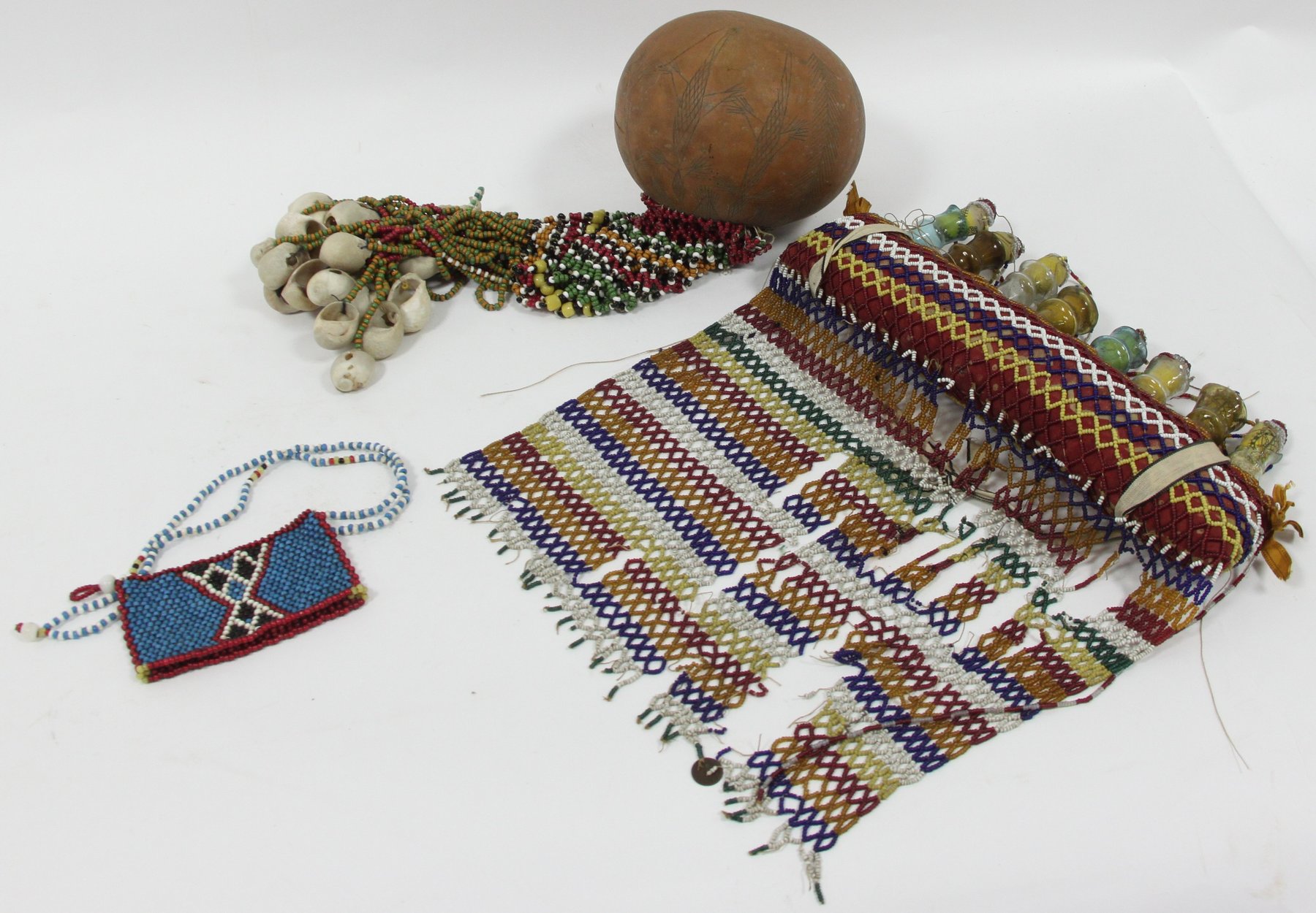 Appraisal: A Turkish medicine pouch woven coloured beads with holder for