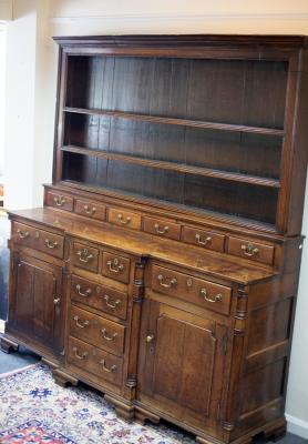 Appraisal: A Georgian oak Welsh dresser the rack above six spice