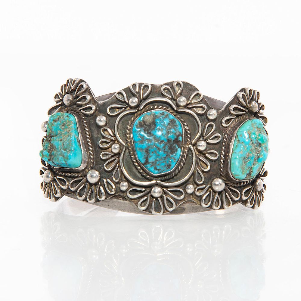 Appraisal: NAVAJO TURQUOISE SILVER BRACELET Three inset turquoise stones with bead