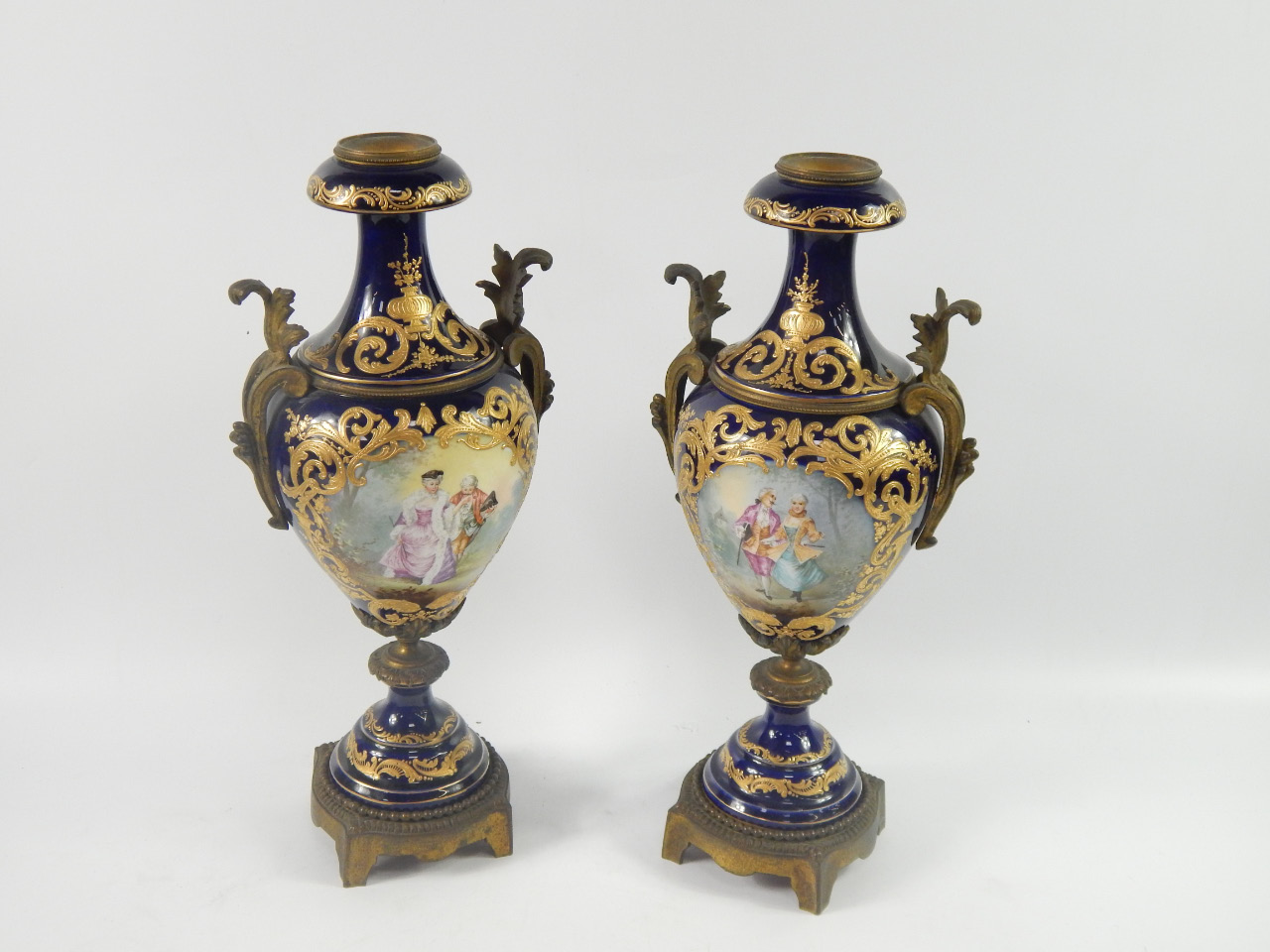 Appraisal: A pair of Sevres porcelain and brass mounted vases late