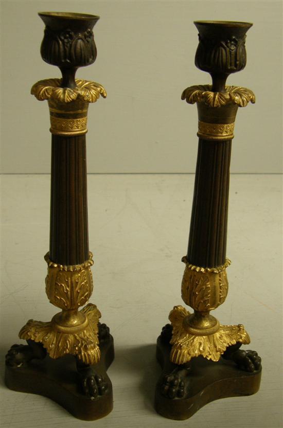 Appraisal: Pair of th Century French bronze and gilt metal candlesticks