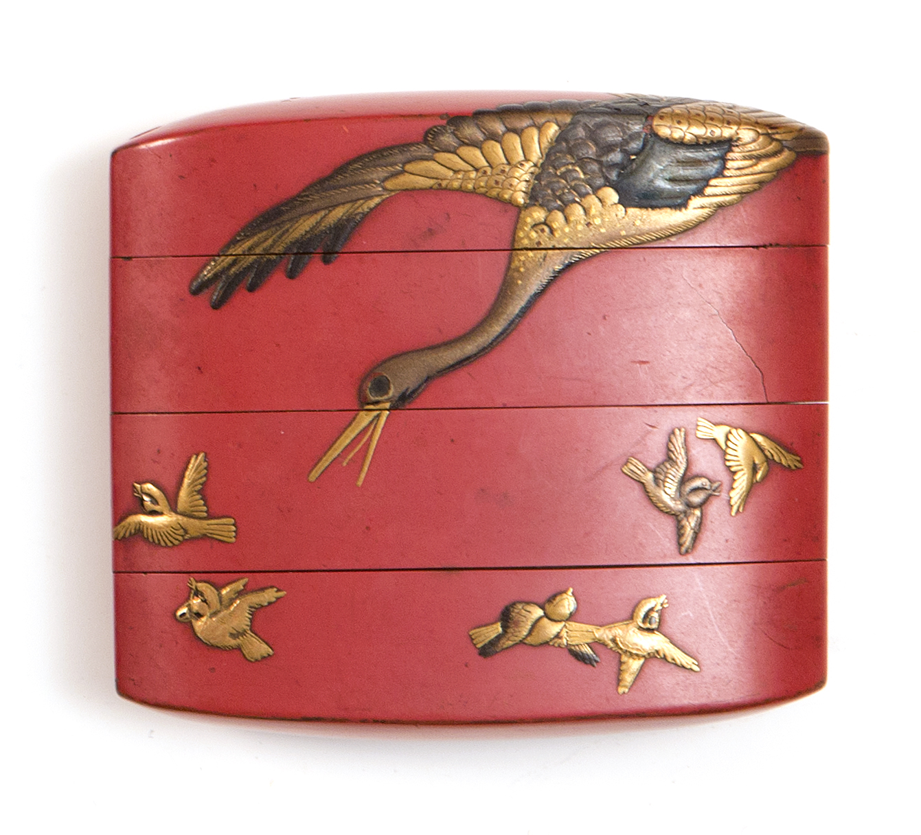 Appraisal: THREE-CASE RED AND GOLD LACQUER INRO th CenturyDepicting a crane