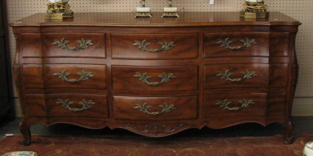 Appraisal: John J Widdicomb Triple Dresser French Bombe style with nine