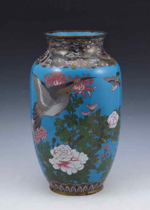 Appraisal: CHINESE CLOISONNE VASE Bird and flower design on blue ground