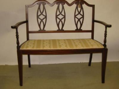 Appraisal: AN EDWARDIAN MAHOGANY PART SALON SUITE with stringing and padded