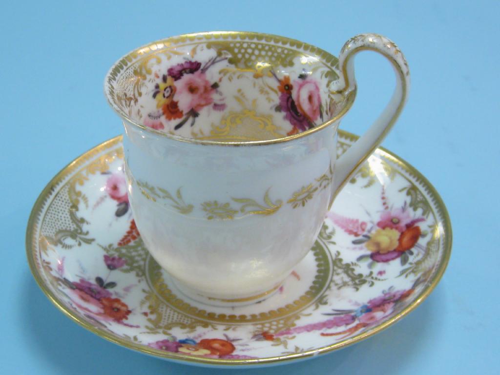 Appraisal: A th Century Coalport Cup and Saucer painted floral bouquets