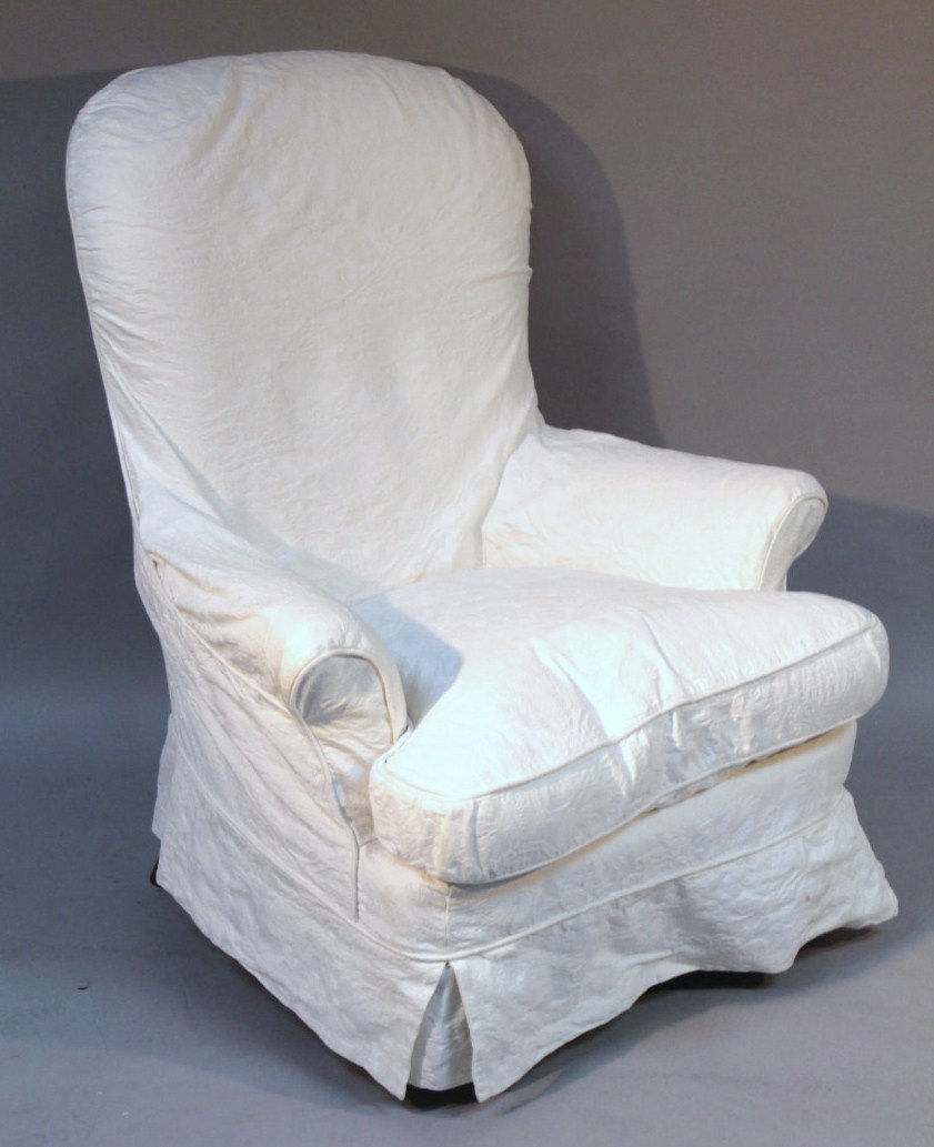 Appraisal: A mahogany framed deep seated open armchair in white textured