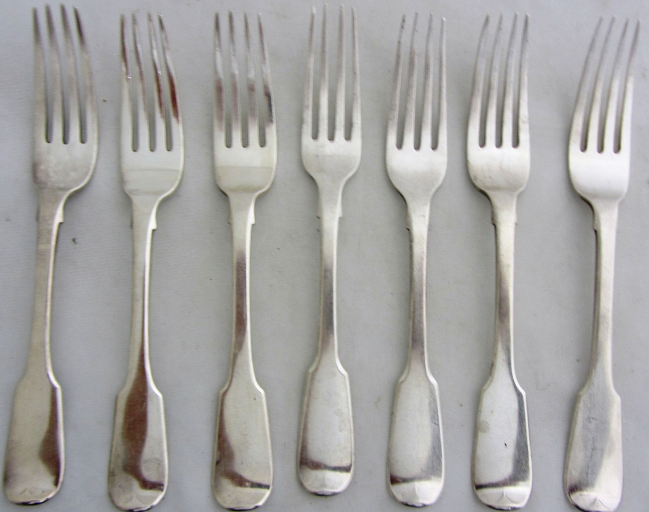 Appraisal: Five silver fiddle pattern dessert forks London and two silver