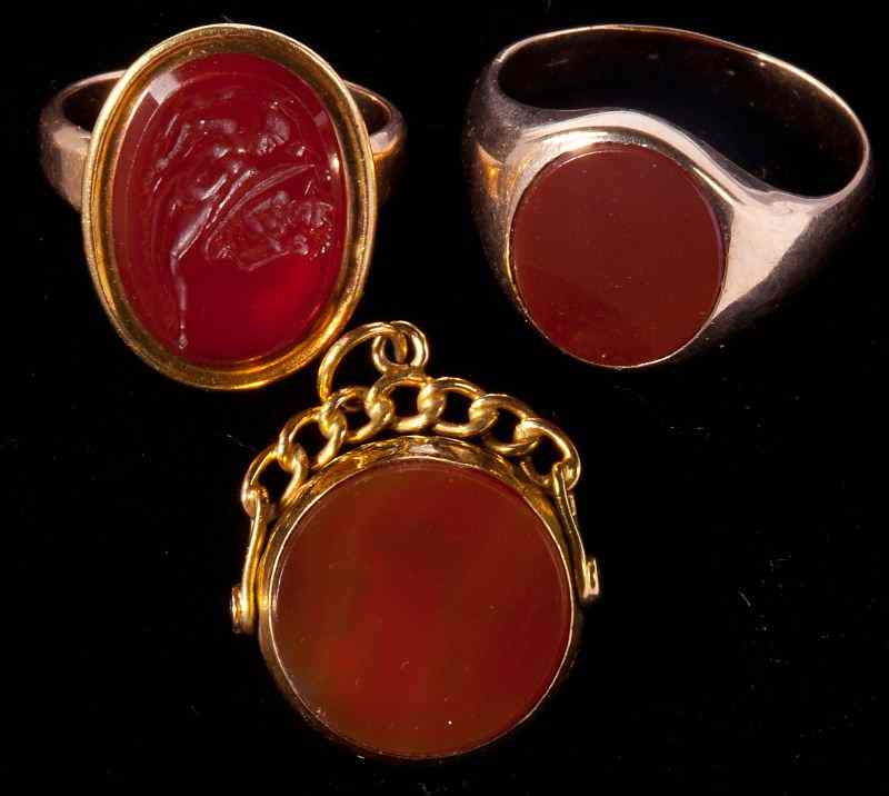 Appraisal: Three Gold and Carnelian Jewelry Itemsincluding an English double sided