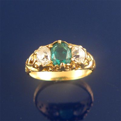 Appraisal: An emerald and diamond ring the cushion shape emerald with